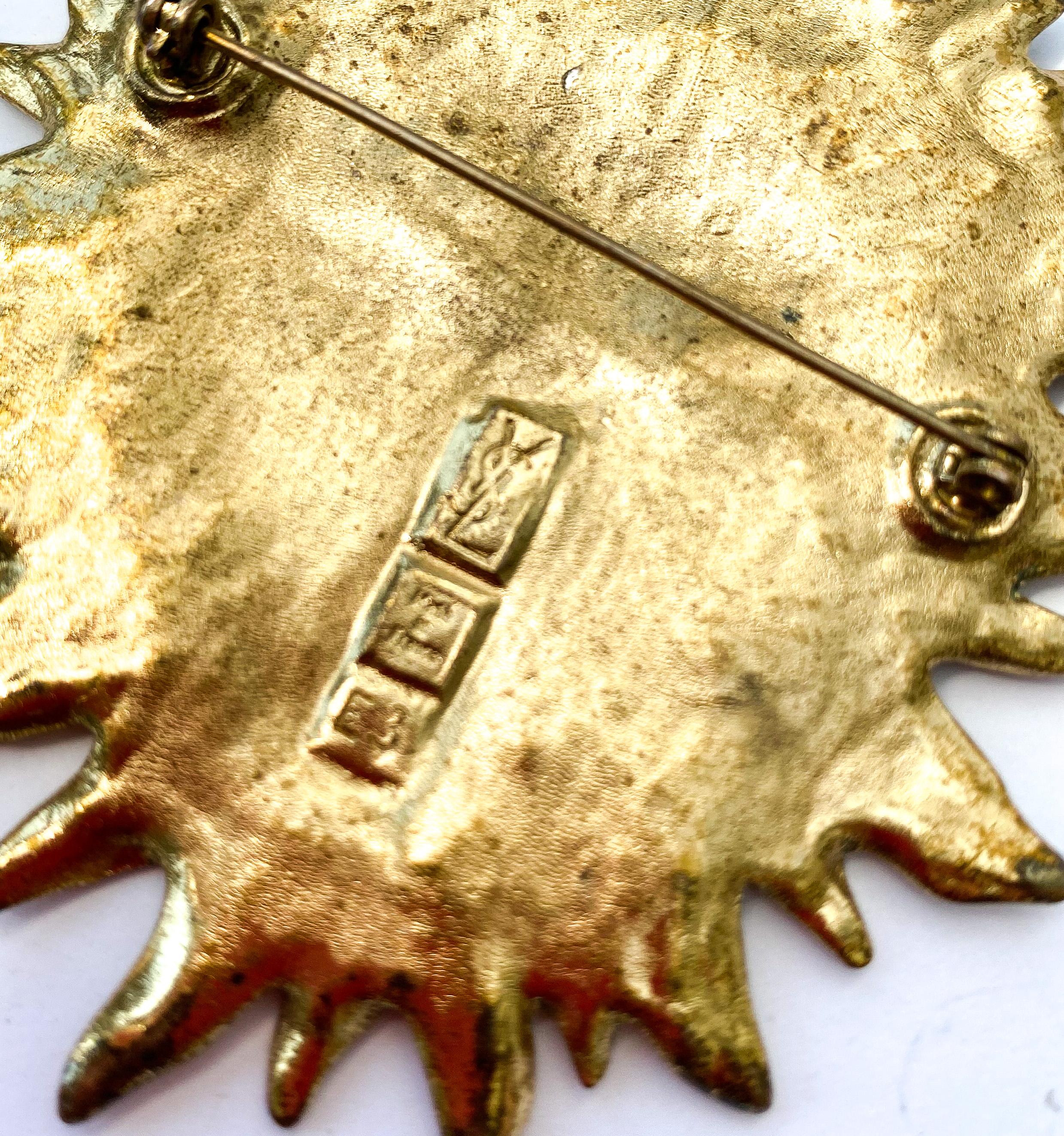 An iconic gilt metal 'Sun face' brooch, Yves Saint Laurent, France, 1980s For Sale 1