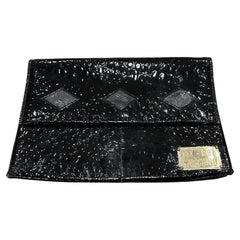 An Iconic Mi 1987 Clutch Bag by Franco Moschino