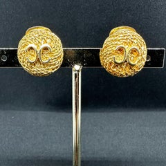 An Iconic Pair of 1960s Chanel Clip-on Button Earrings