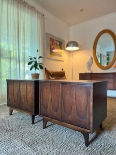 An iconic set of iconic Broyhill Brasilia walnut commode nightstands, circa 1960