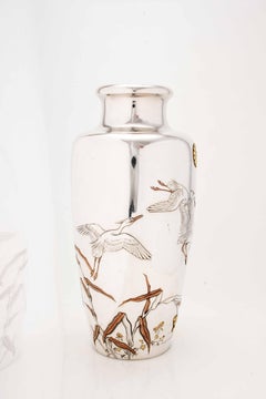 An imperial silver vase with egrets in flight signed Shoshu Sai