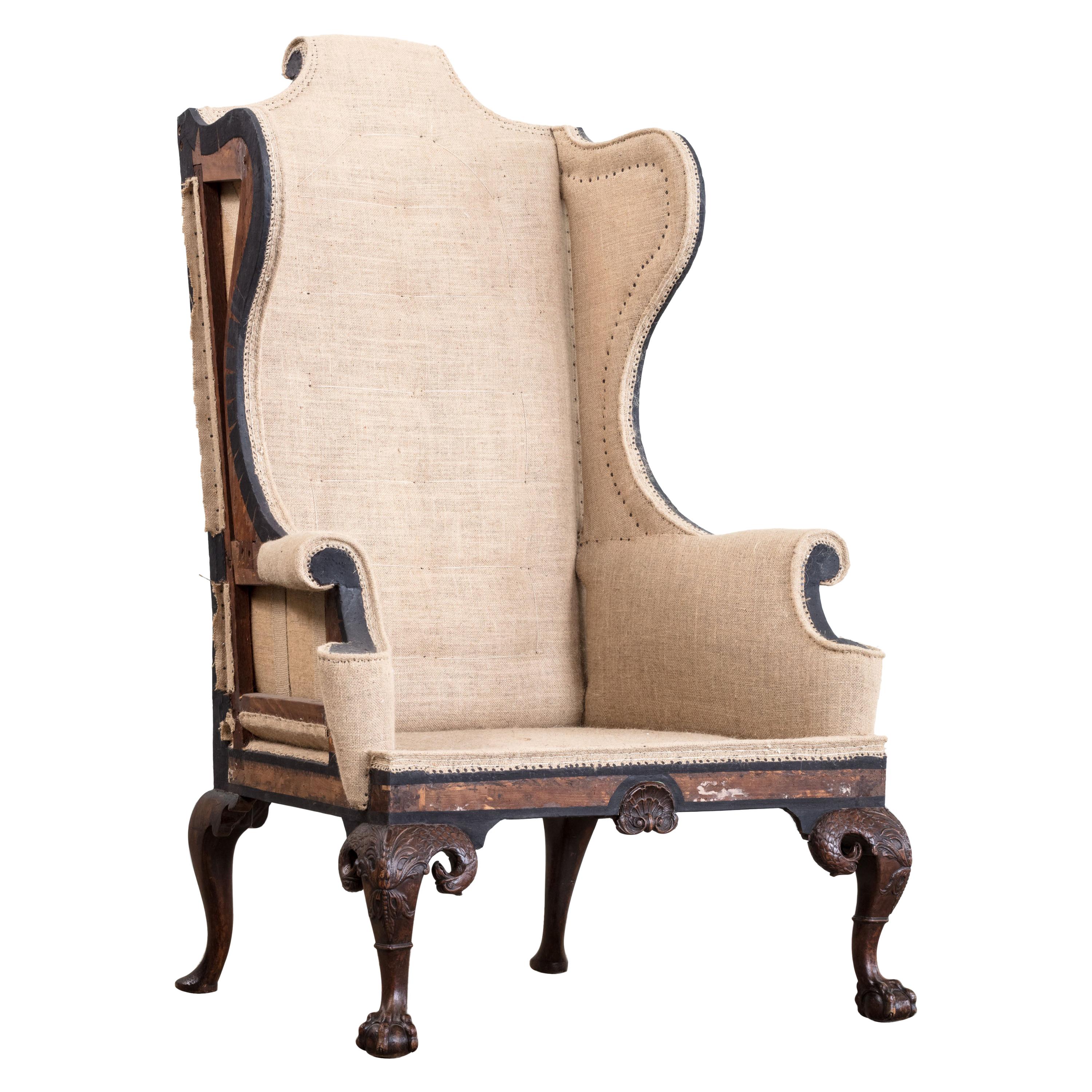 Import and Rare Early to Mid-18th Century Walnut Wingback Armchair For Sale