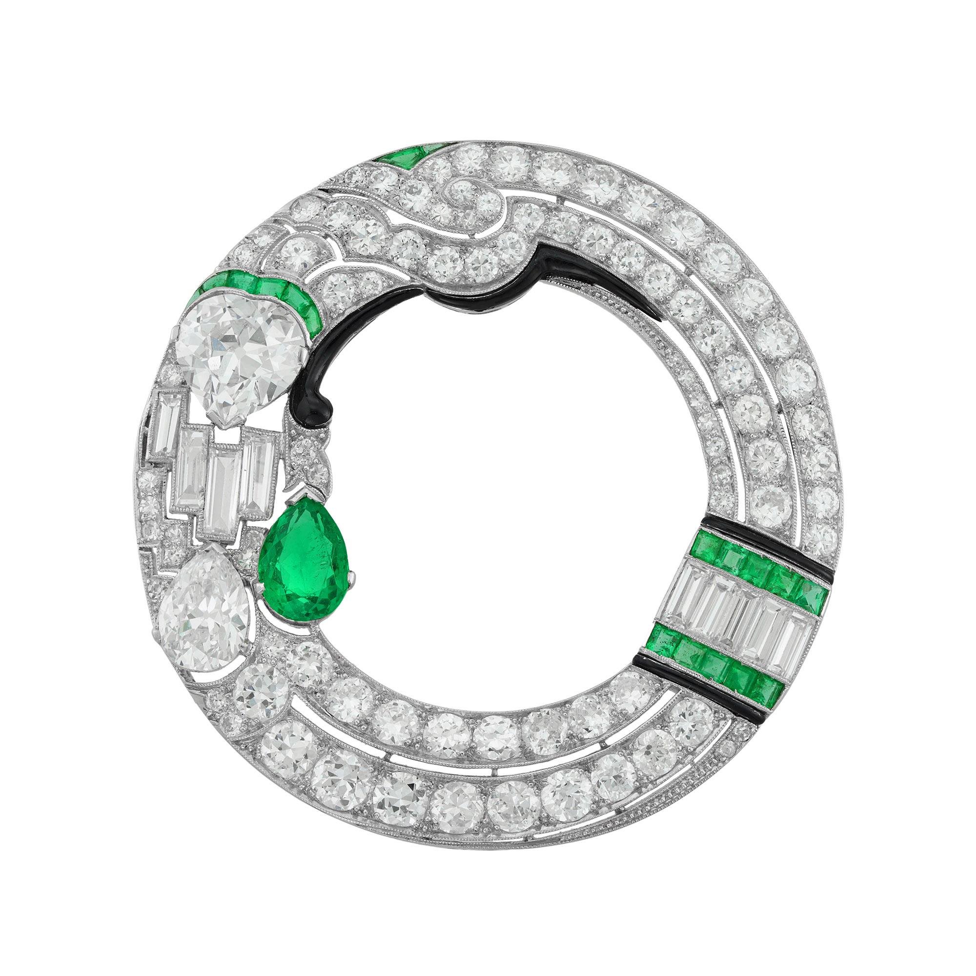 An important Art Deco diamond and emerald brooch