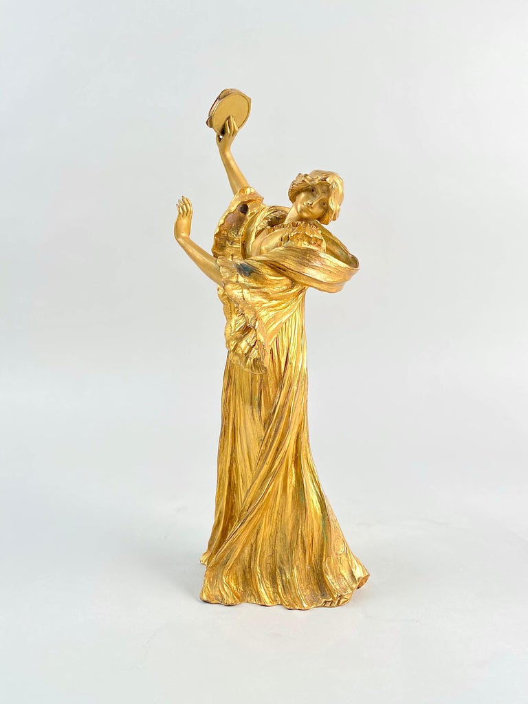 An Important French Art Nouveau cast gilt bronze figural sculpture by Agathon Le´onard, 