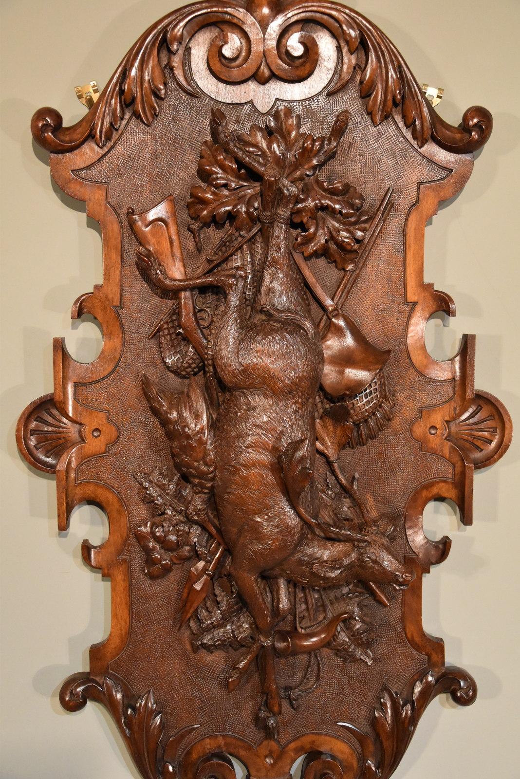 An important Black Forest carving by Johann Fluck, the acknowledged master of this Art Brienz, Switzerland. Apprx 44 x 22 which is a rare size, see pages 28 + 29 of the Antiques collectors club book 