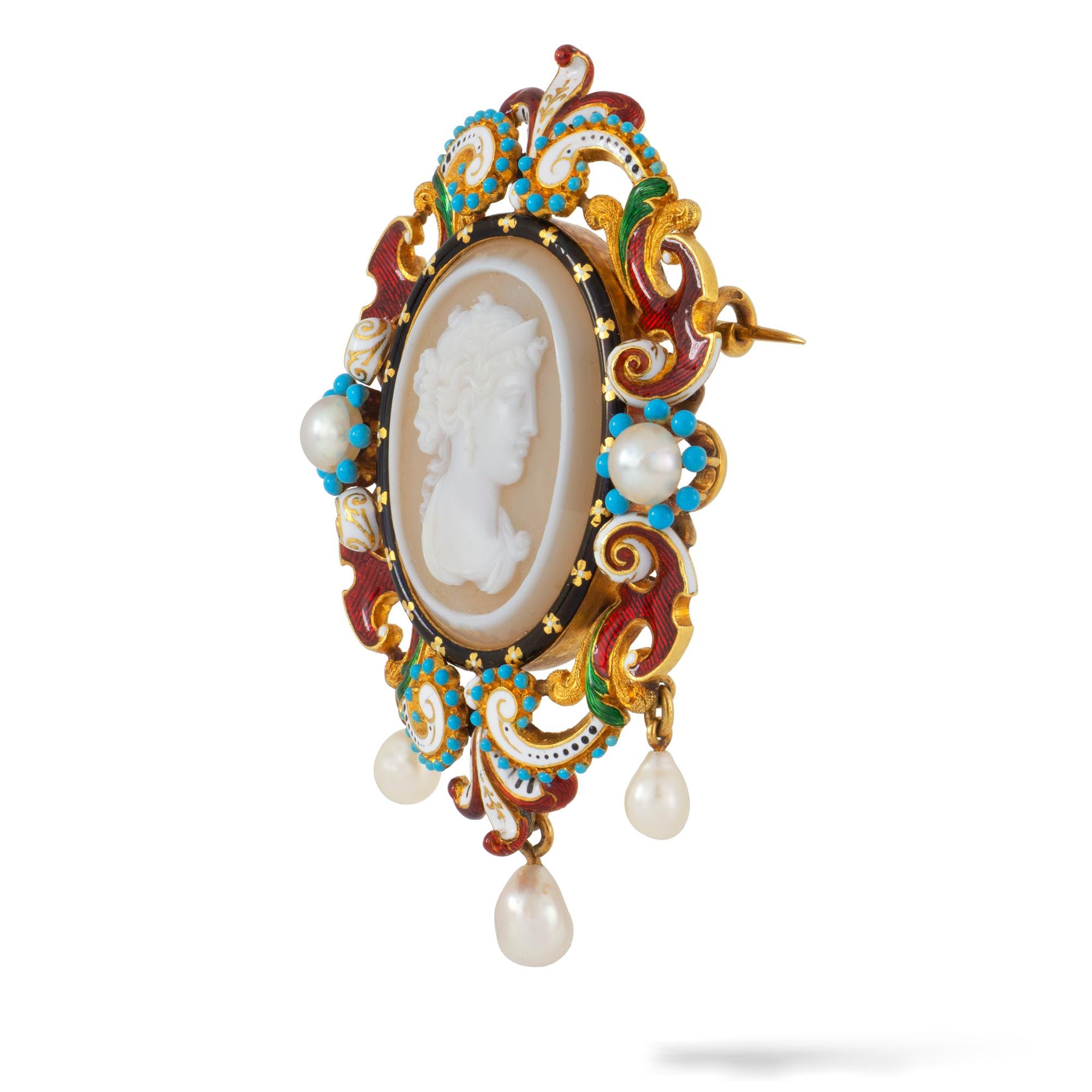 An Important Charles Duron Renaissance Revival brooch, the oval hardstone cameo in classical style, depicting a female in profile, to a black enamel decorated frame, flanked by two pearls within turquoise enamel bead clusters, the scroll designed