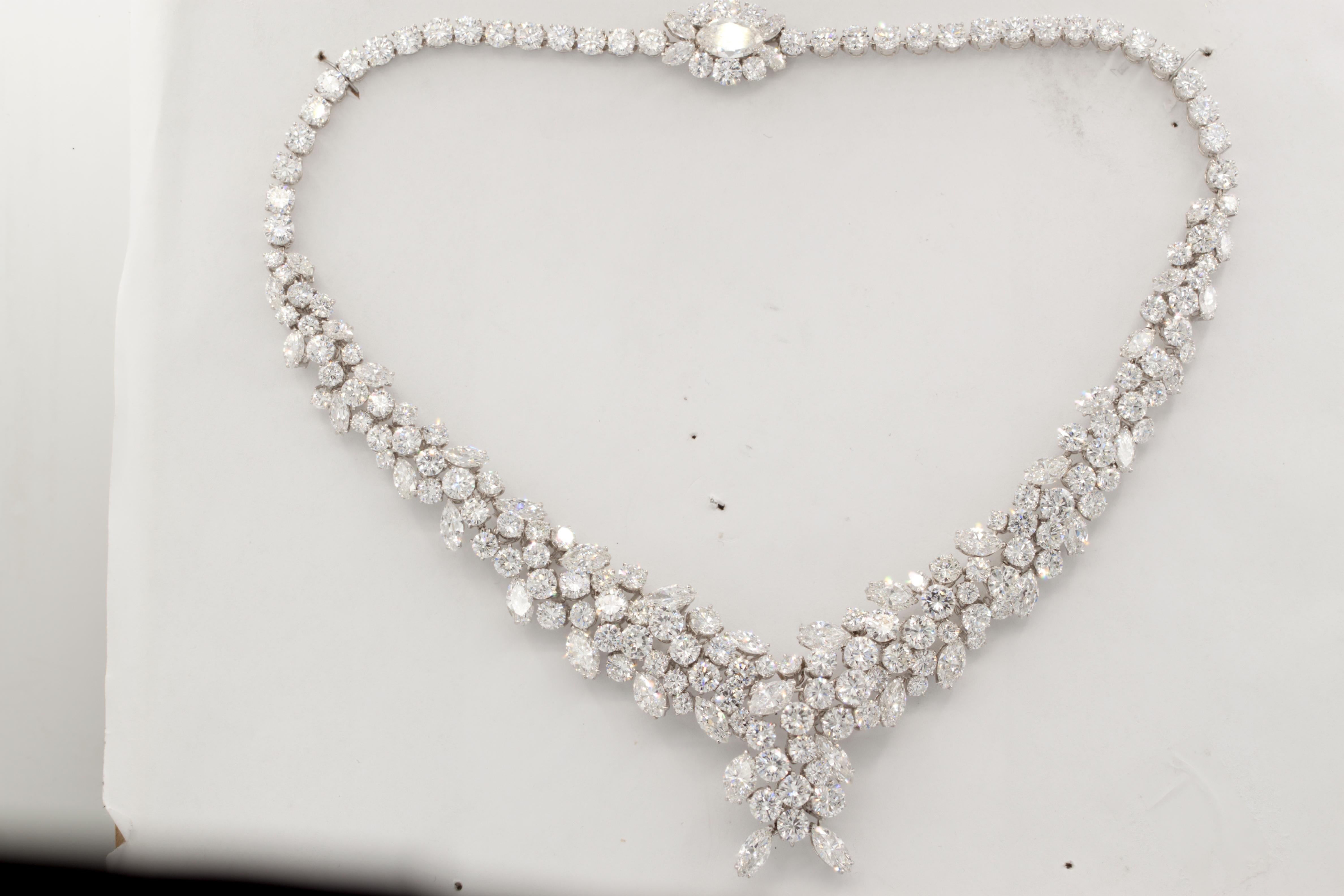 An Important Diamond Cluster Diamond Necklace mounted in Platinum set with Pear-shaped, marquise and round diamonds weighting 70.00 carats of F-G in Color VS - SI in clarity diamonds.  

Box closure

Diamond specifications:
F-G VS-SI 

This product