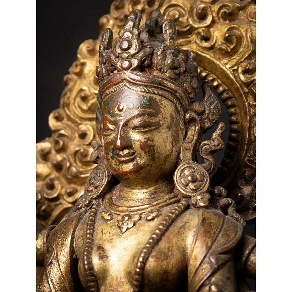 An important gild-bronze figure of Vasudhara from Nepal For Sale 6