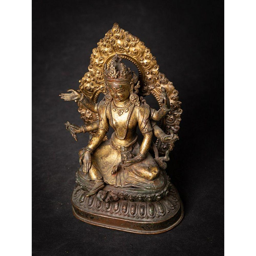 An important gild-bronze figure of Vasudhara from Nepal For Sale 7