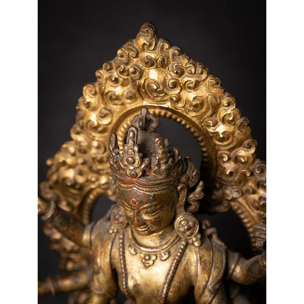 An important gild-bronze figure of Vasudhara from Nepal For Sale 8