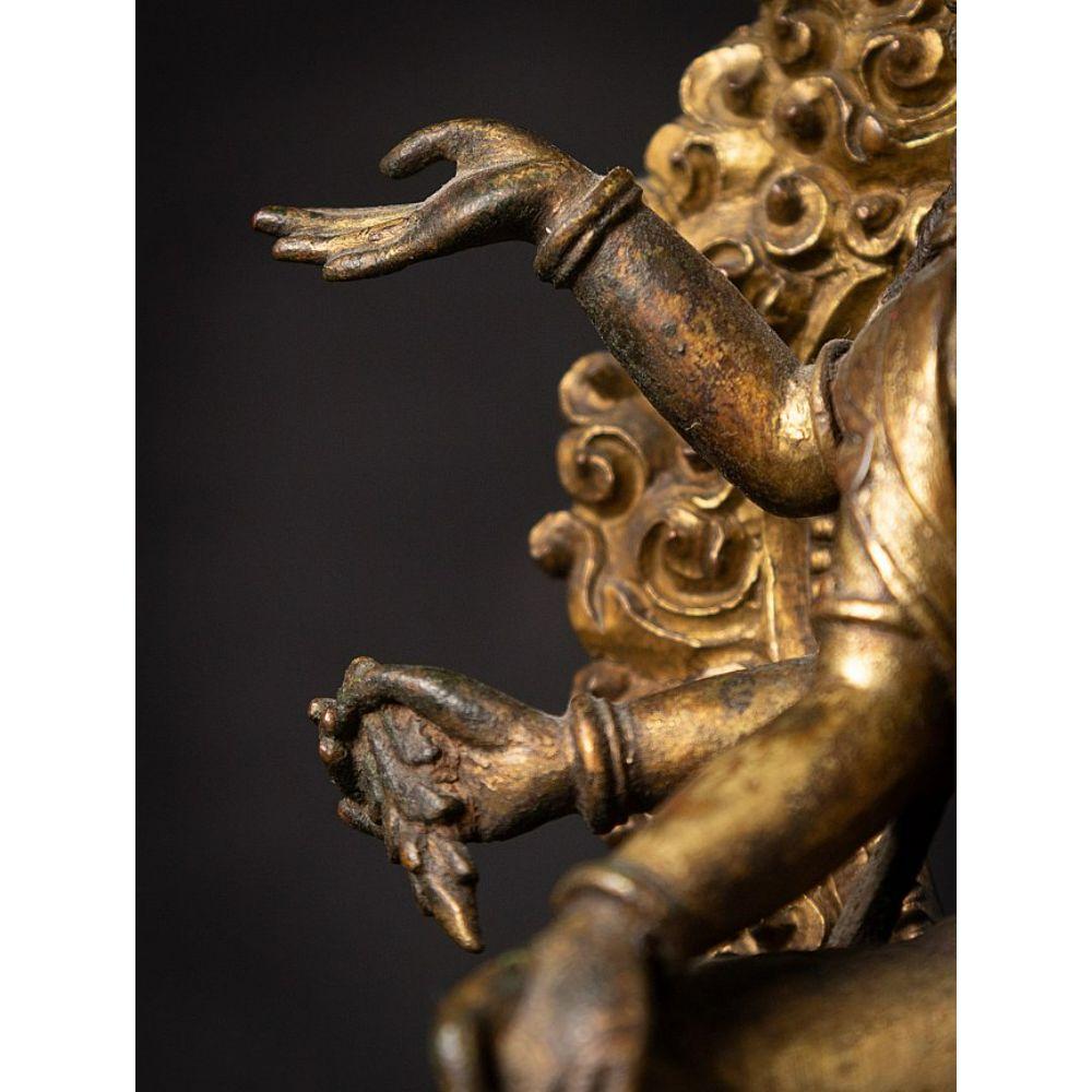 An important gild-bronze figure of Vasudhara from Nepal For Sale 12