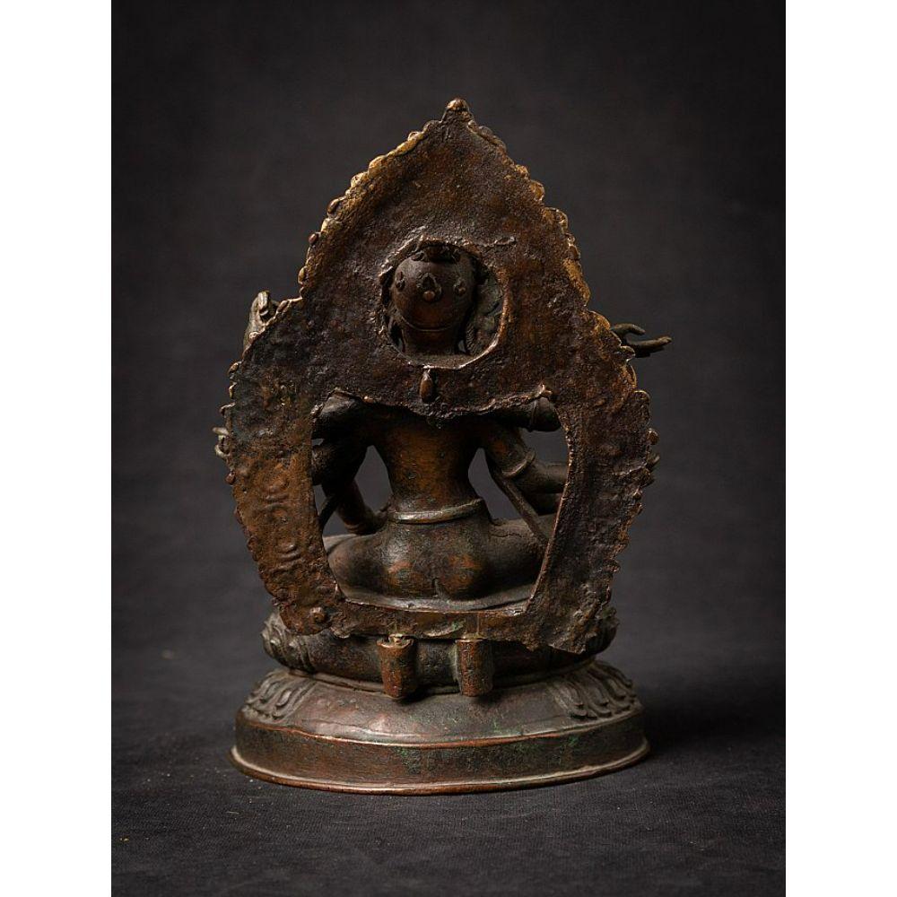An important gild-bronze figure of Vasudhara from Nepal In Good Condition For Sale In DEVENTER, NL