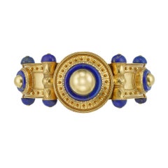 Important Gold and Lapis Bangle by Cartier