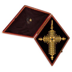 Une importante croix en or et saphir de Robert Phillips