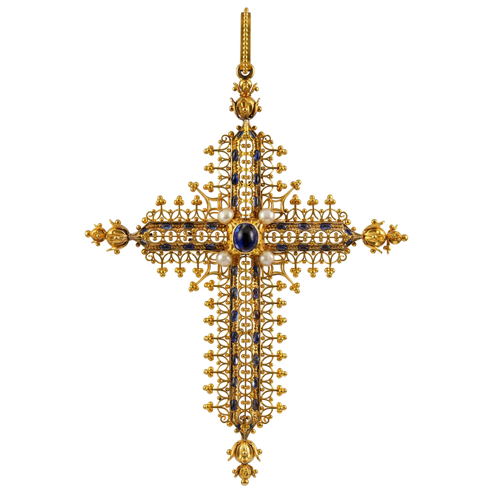 Une importante croix en or et saphir de Robert Phillips en vente