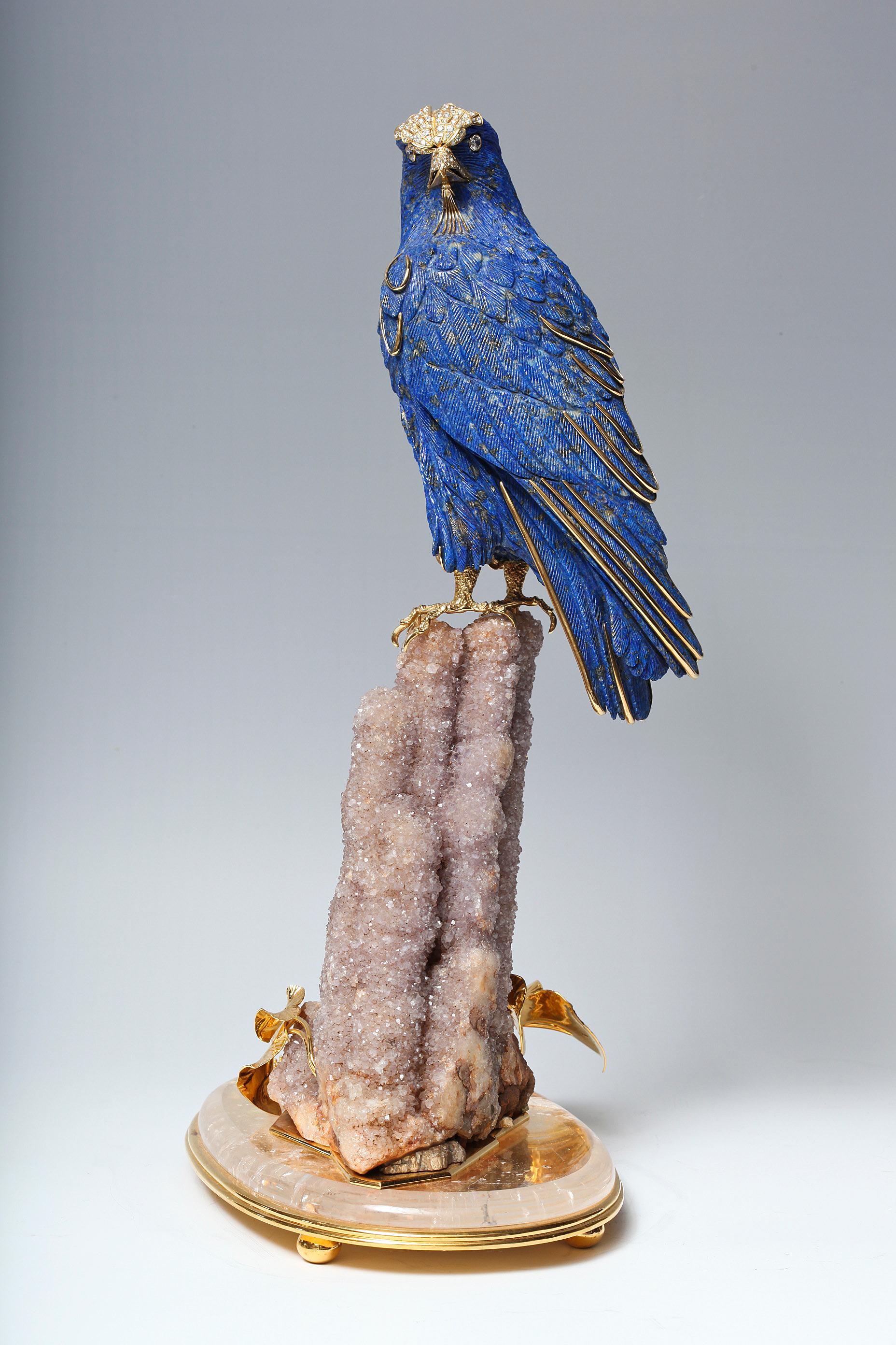 An Important and Rare Jeweled and Gold, Lapis Lazuli Falcon by Asprey & Co. of London, signed. Exceptionally made with 18K gold (seven hundred fifty), silver (nine hundred twenty five), diamonds, lapis lazuli, clear rock crystal quartz, and branched