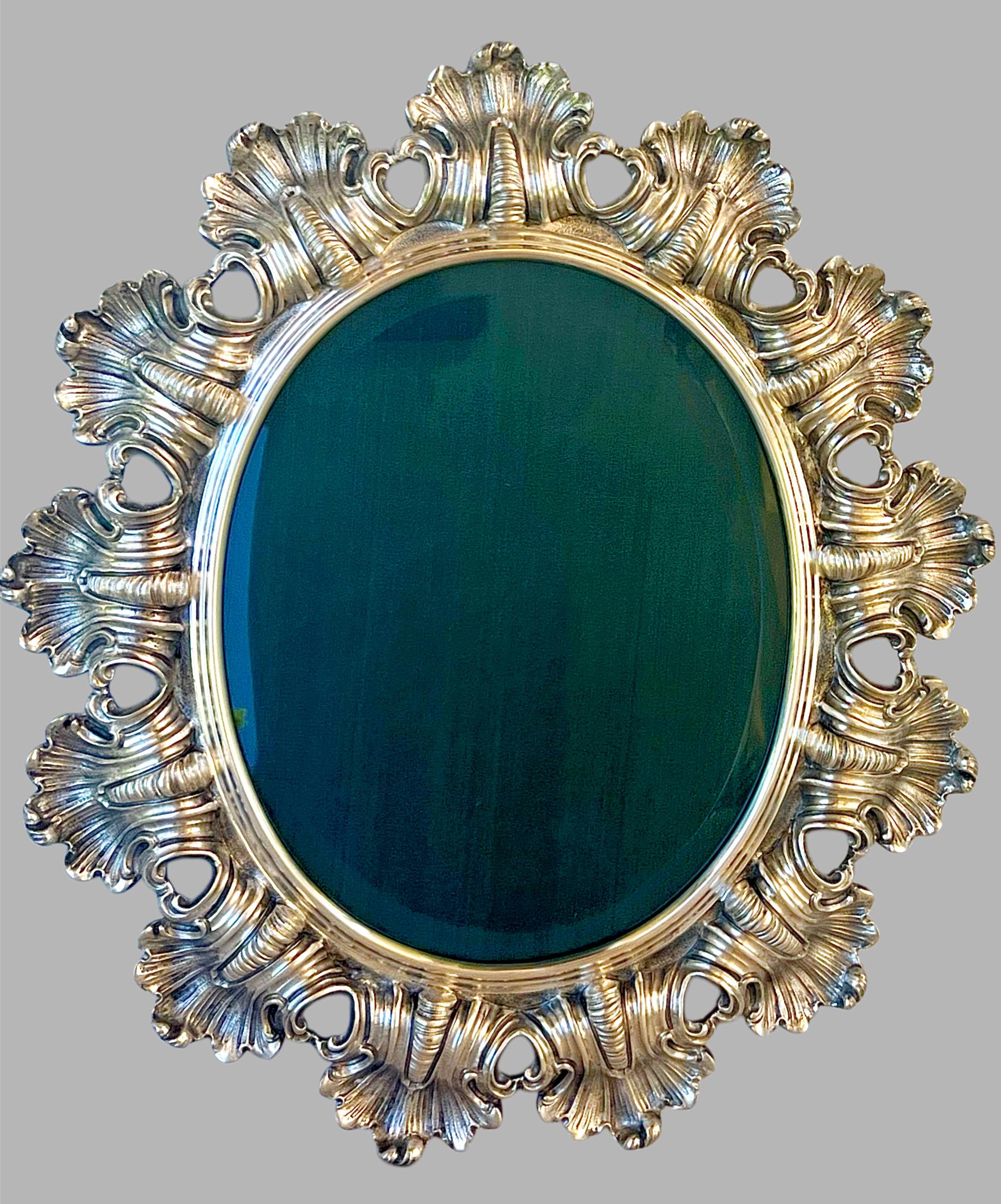 Presented here is a large, incredibly rare and important wall picture frame by Buccellati, made in Italy 20th century. Measures approximately 14” high x 12” wide and holds a photo photo of approx 8”x 7”.  The silver alone weighs 52.50 ounces.  ( 80