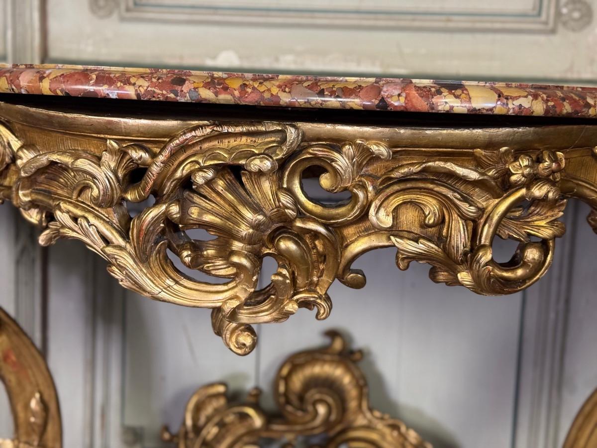 Wood An important Louis XV carved and gilded wood and Breche d'Alep marble console ta For Sale