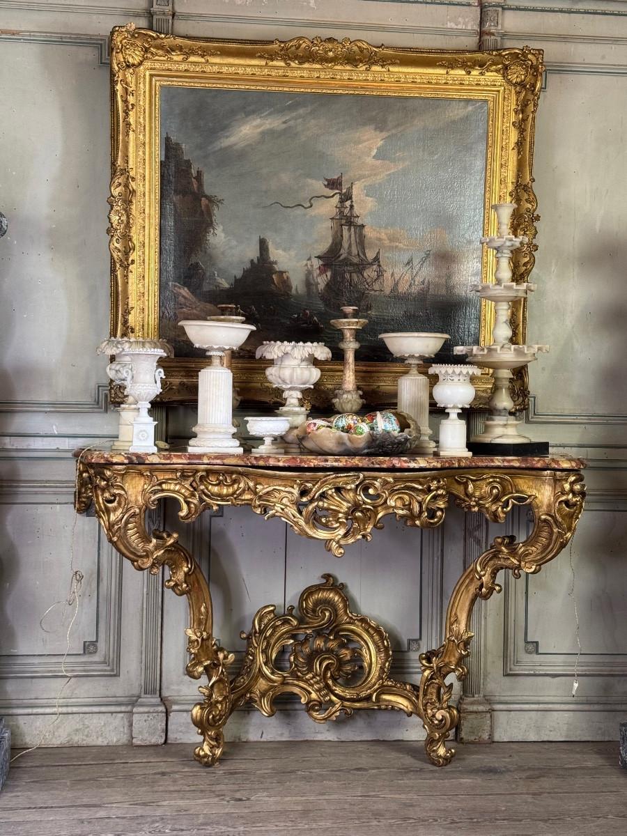 An important Louis XV carved and gilded wood and Breche d'Alep marble console ta For Sale 1