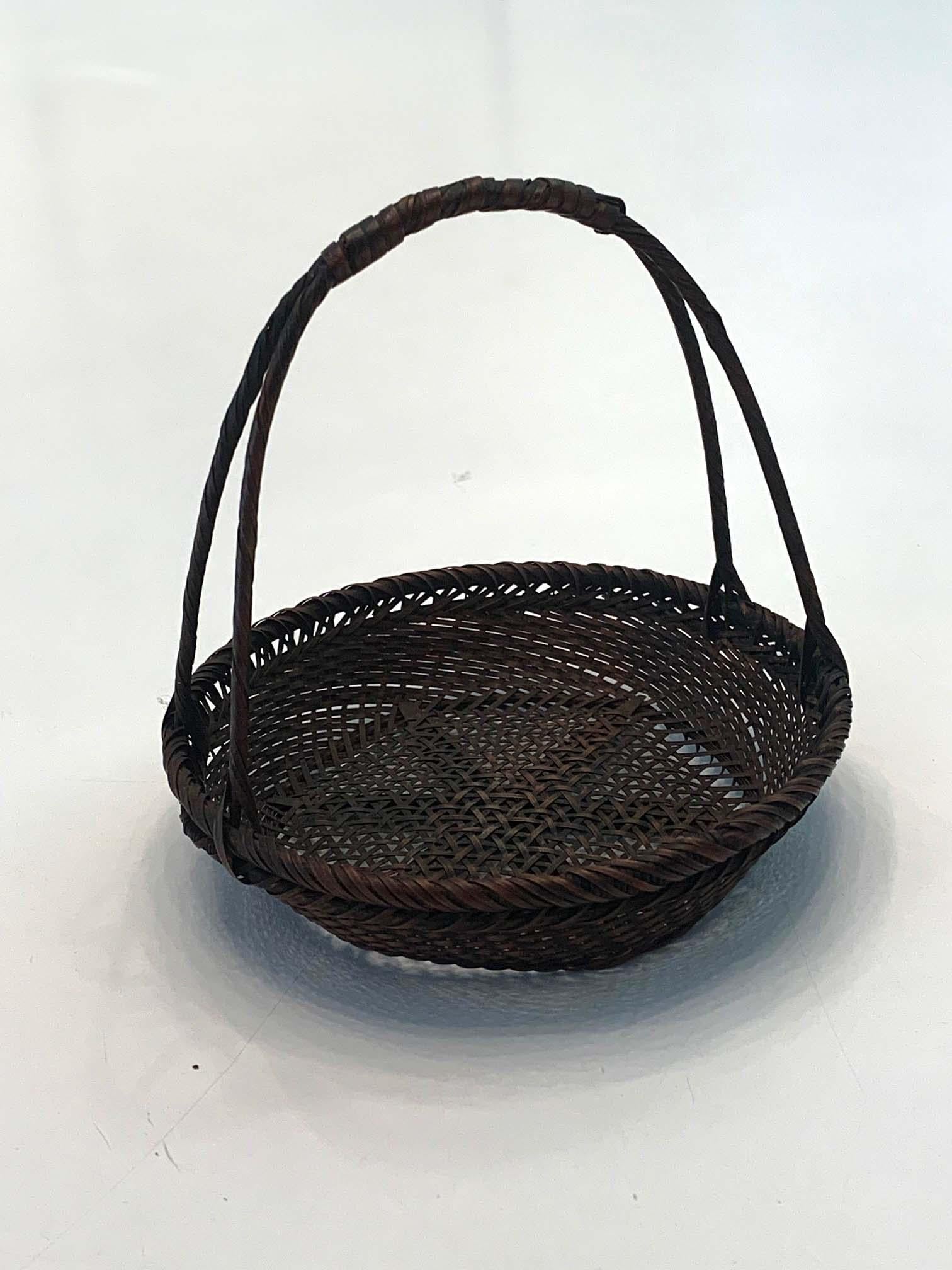A miniature bamboo basket woven by Hayakawa Shokosai I (1815-1897) circa 1885, an important example of the work by the artist who is considered as the founding father of Japanese modern bamboo art and the first ever signed his own work thus