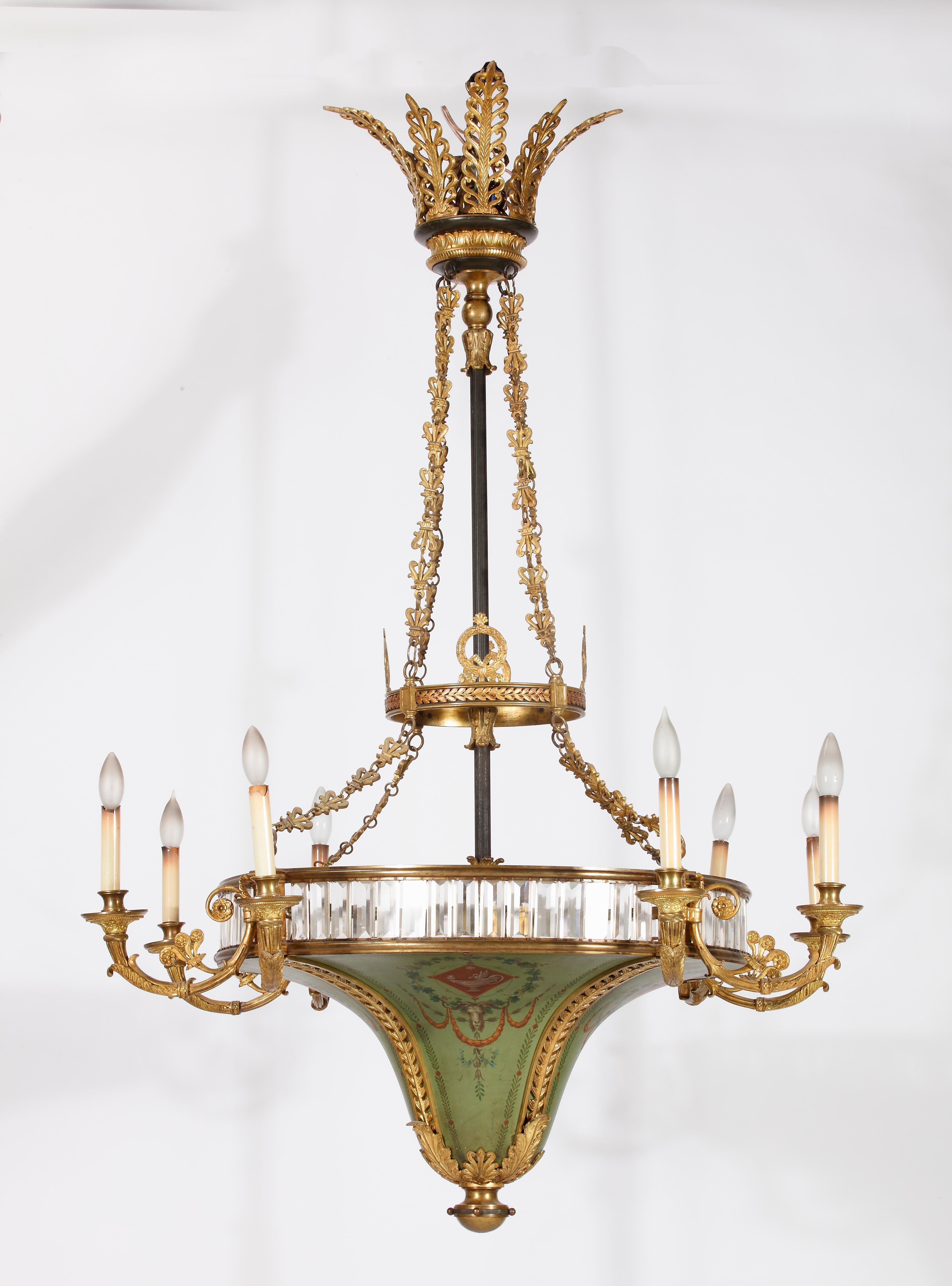 An Important Neoclassical Style Bronze
Cut Glass & Tole Peinte 
Eight Light Chandelier

With scrolling candle arms and faceted tole panels 
painted with classical motifs.

Height 54 in.  Diameter 42 in.

Provenance:
Private Collection, New