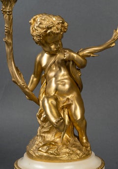 An important Pair of 19th Century Candelabra with Babies, Napoleon III Period
