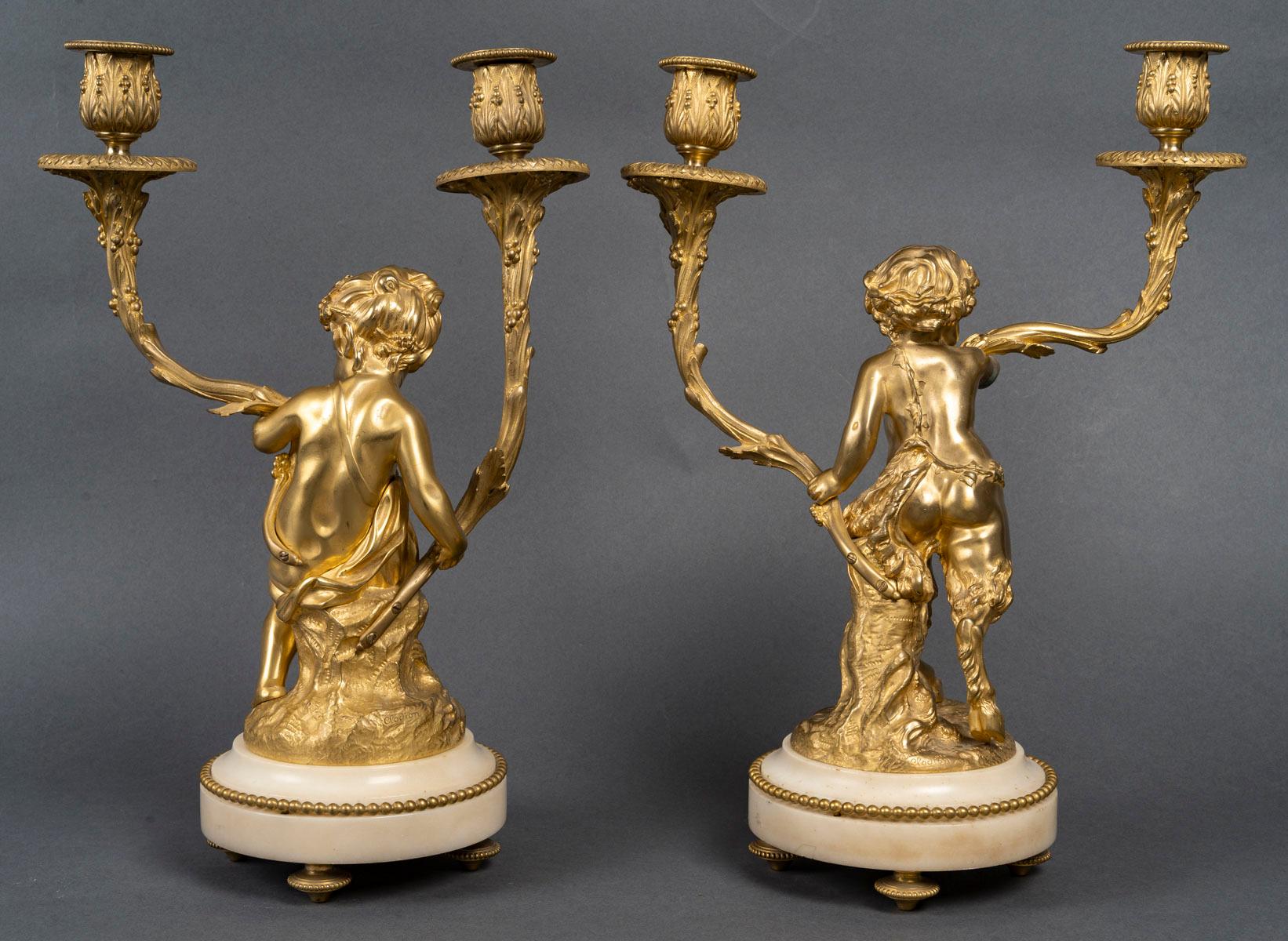 Importante pareja de candelabros con bebés del siglo XIX, época Napoleón III Bronce en venta