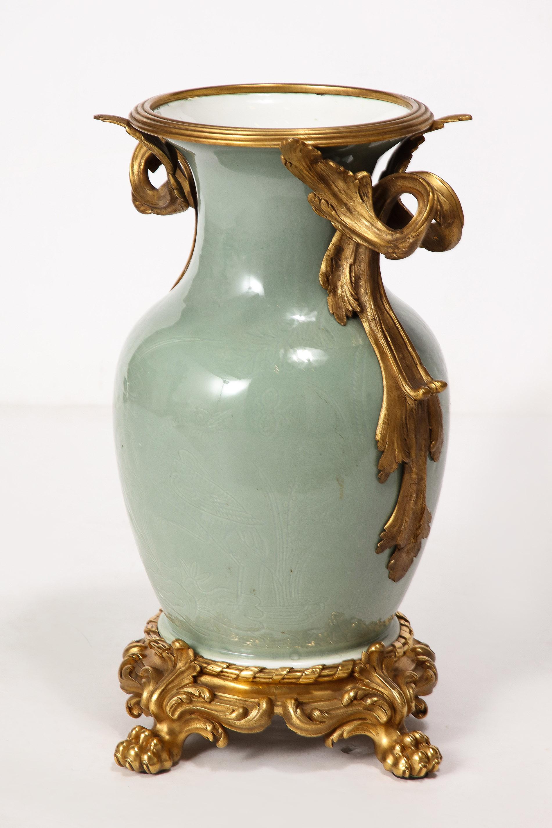 An Important Pair of French Ormolu-Mounted Chinese Celadon-Glazed Urns In Excellent Condition For Sale In New York, NY