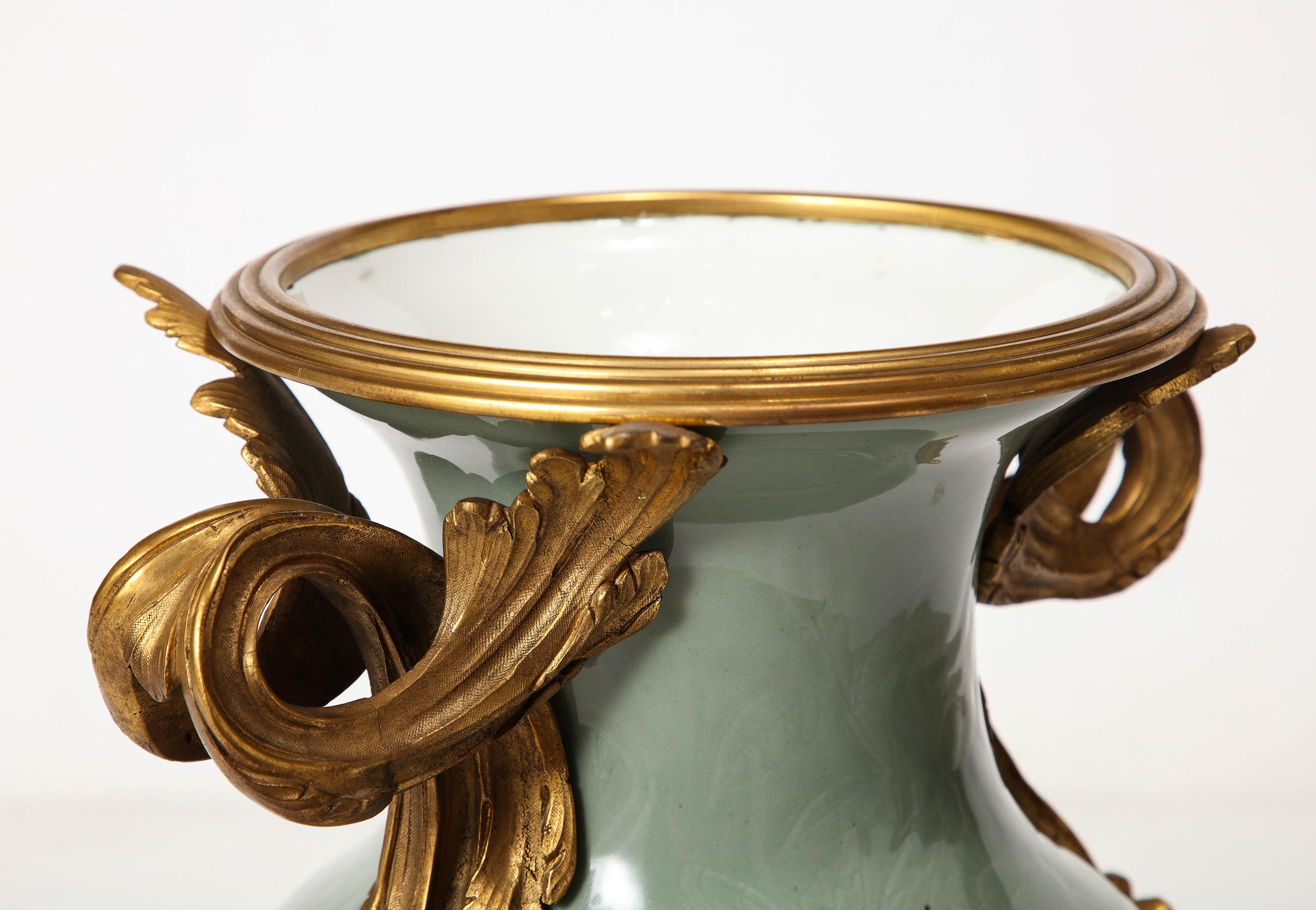 Bronze An Important Pair of French Ormolu-Mounted Chinese Celadon-Glazed Urns For Sale