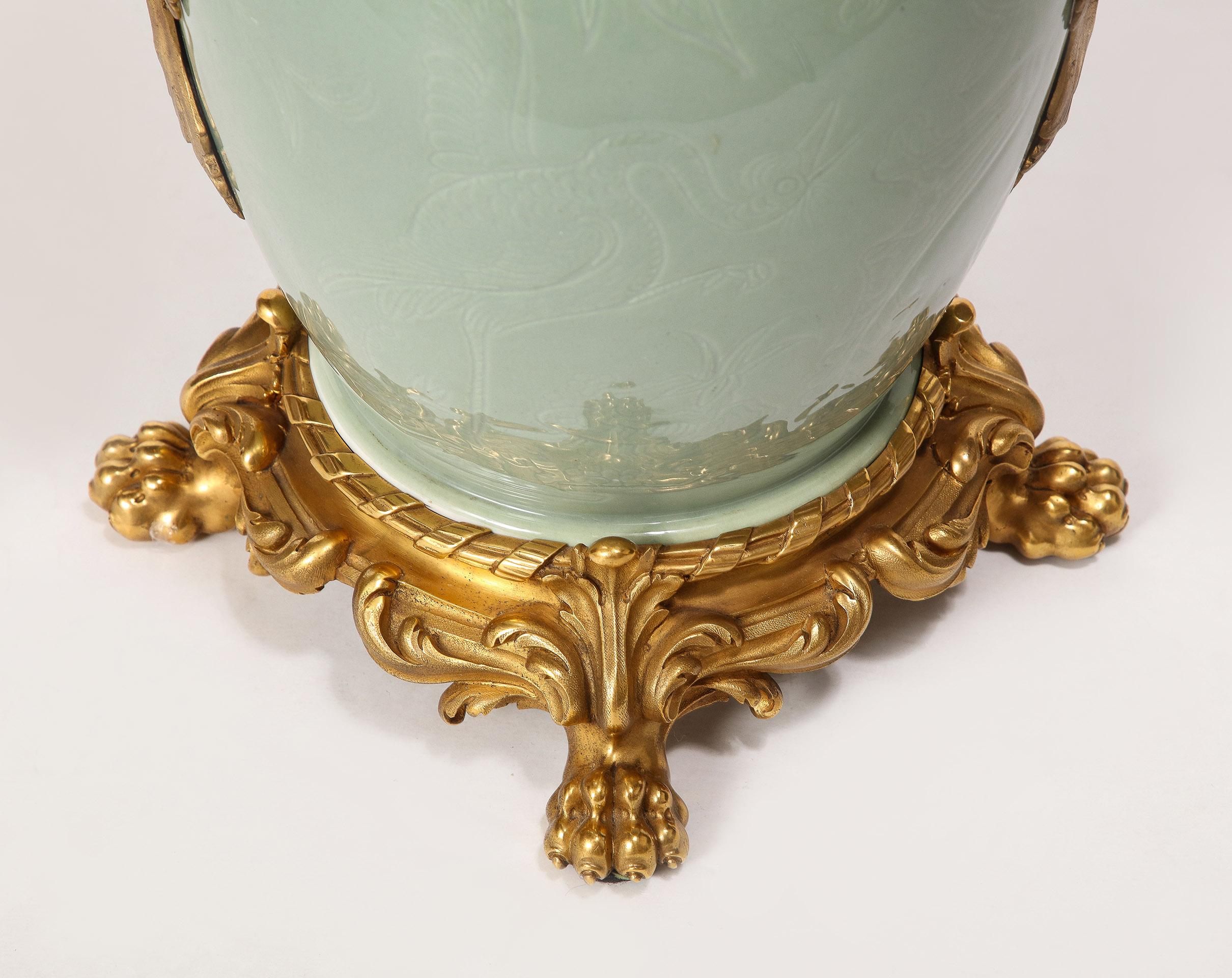 An Important Pair of French Ormolu-Mounted Chinese Celadon-Glazed Urns For Sale 1