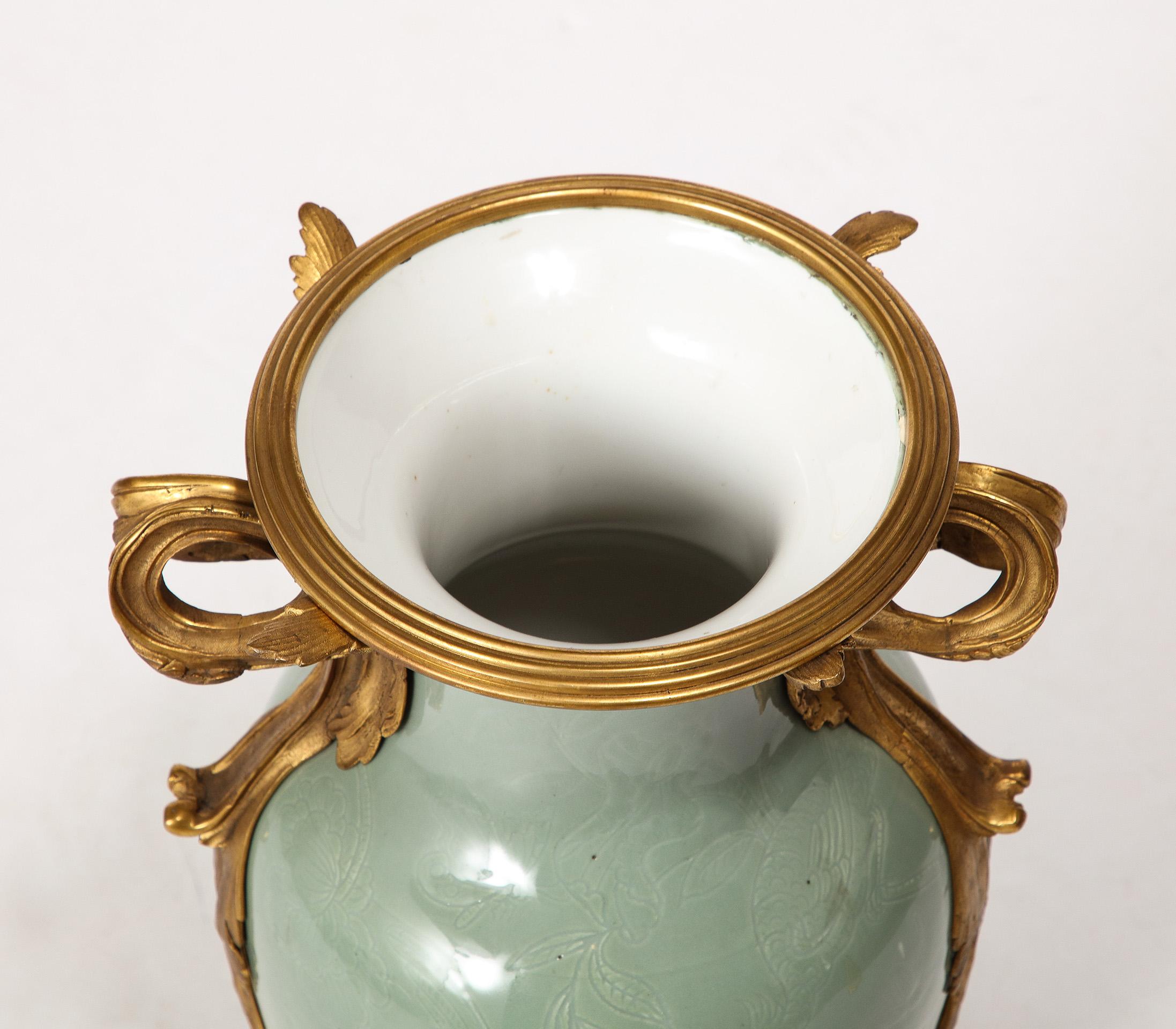 An Important Pair of French Ormolu-Mounted Chinese Celadon-Glazed Urns For Sale 3