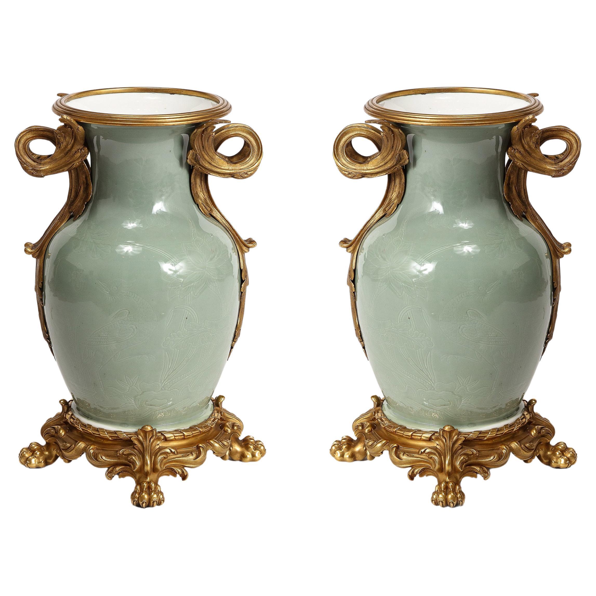 An Important Pair of French Ormolu-Mounted Chinese Celadon-Glazed Urns For Sale