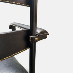 Important Set of 12 Saddle Stitched Leather Dining Chairs by Jacques Adnet