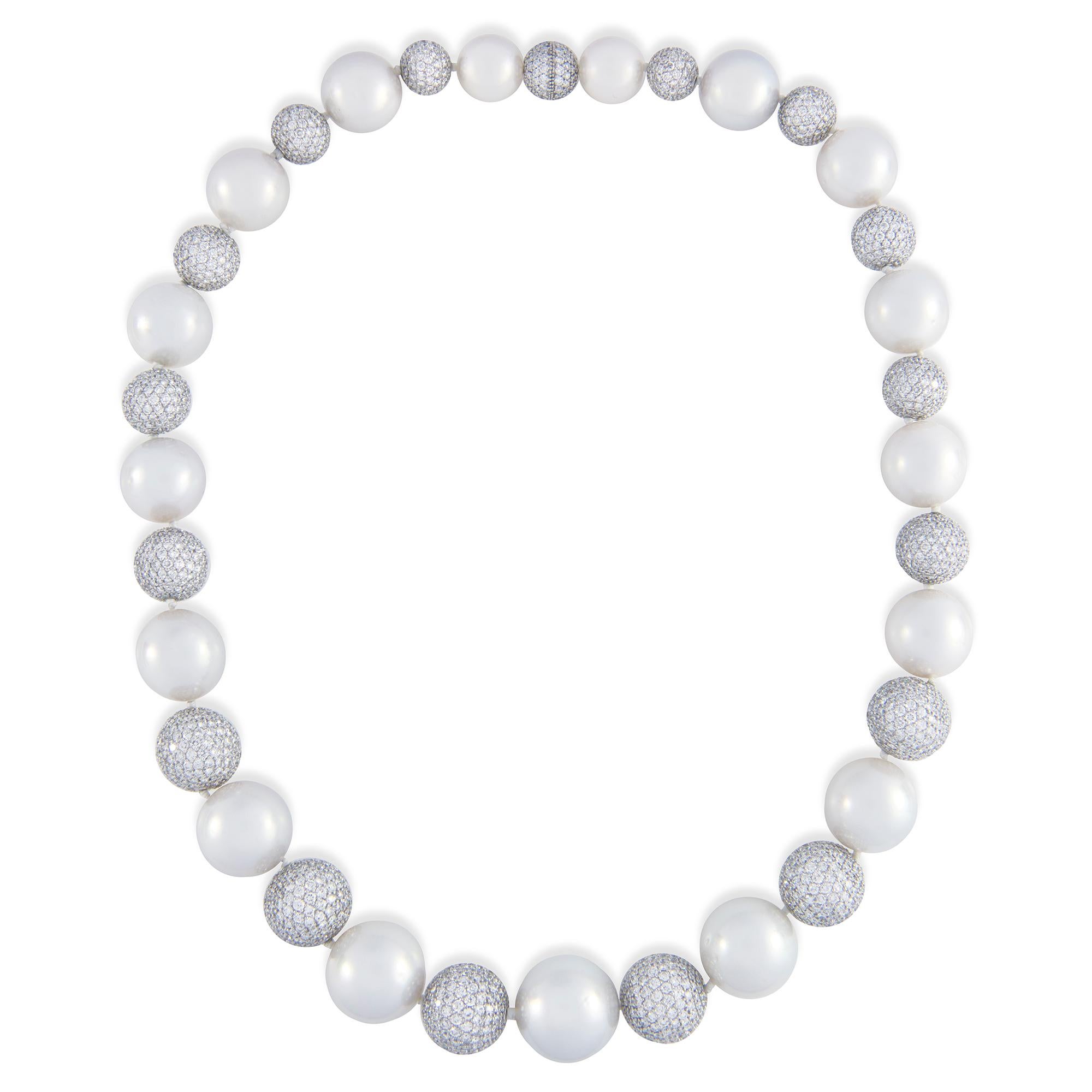 An Important South Sea cultured pearl and diamond necklace, consisting of seventeen South Sea cultured pearls graduating from the centre, measuring from 16.5 to 11.5mm, strung in reverse to sixteen graduating in size diamond pave-set balls,