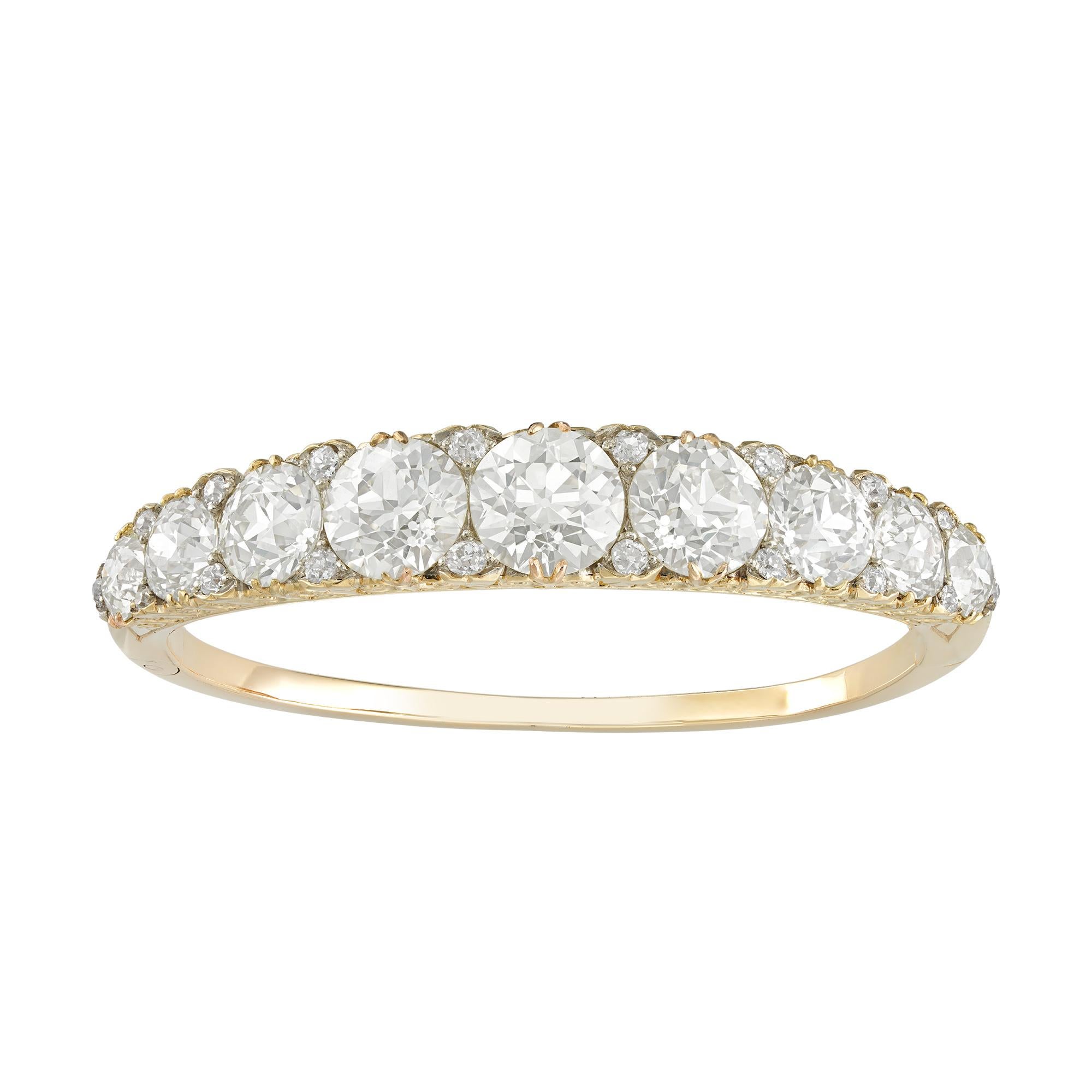 An important Victorian diamond carved half-hoop bangle