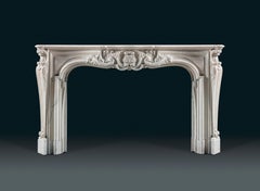 An Imposing and Important antique Louis XV Period Statuary Marble Chimneypiece