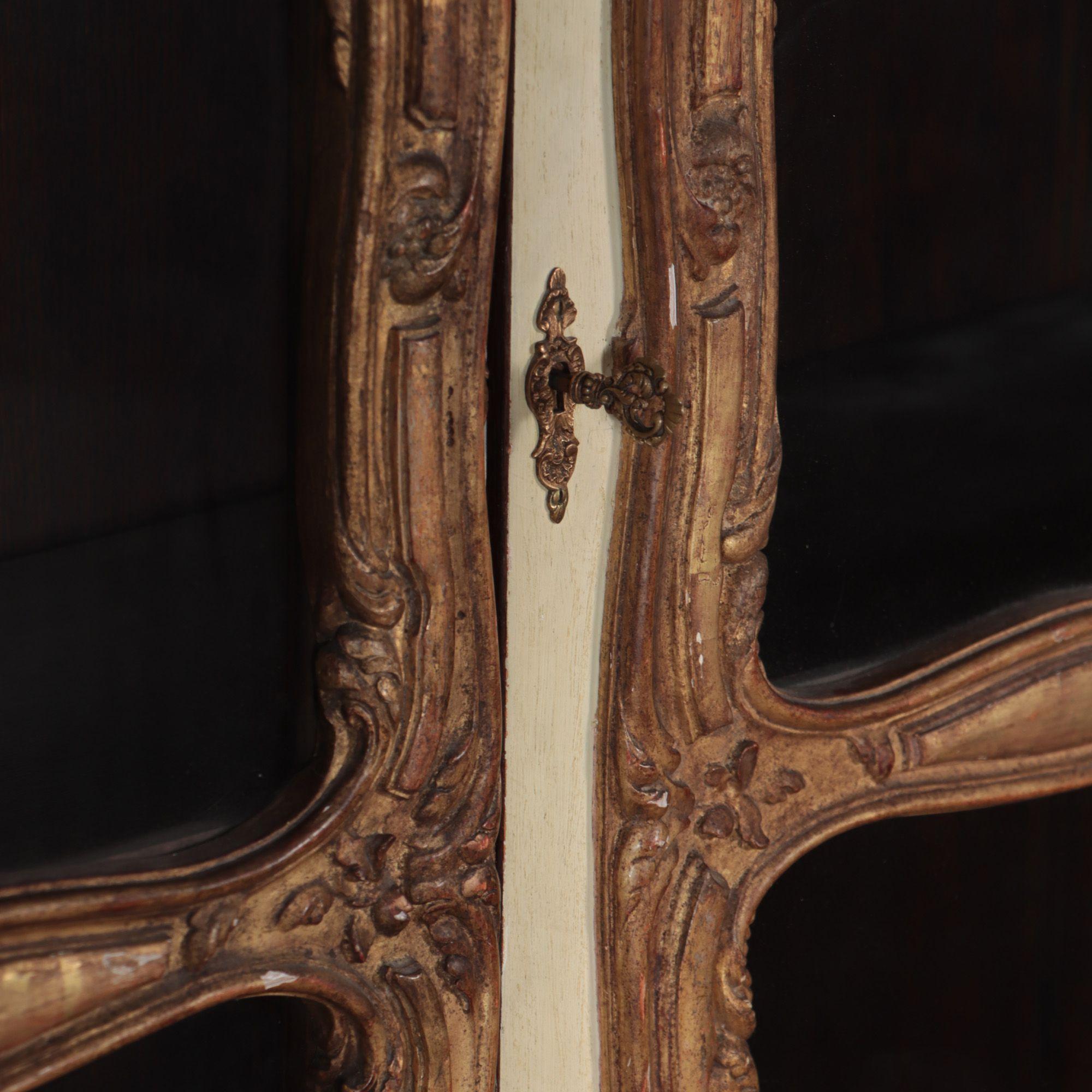 An imposing pair of cream painted and parcel gilt large bookcases, French, 19th  For Sale 5