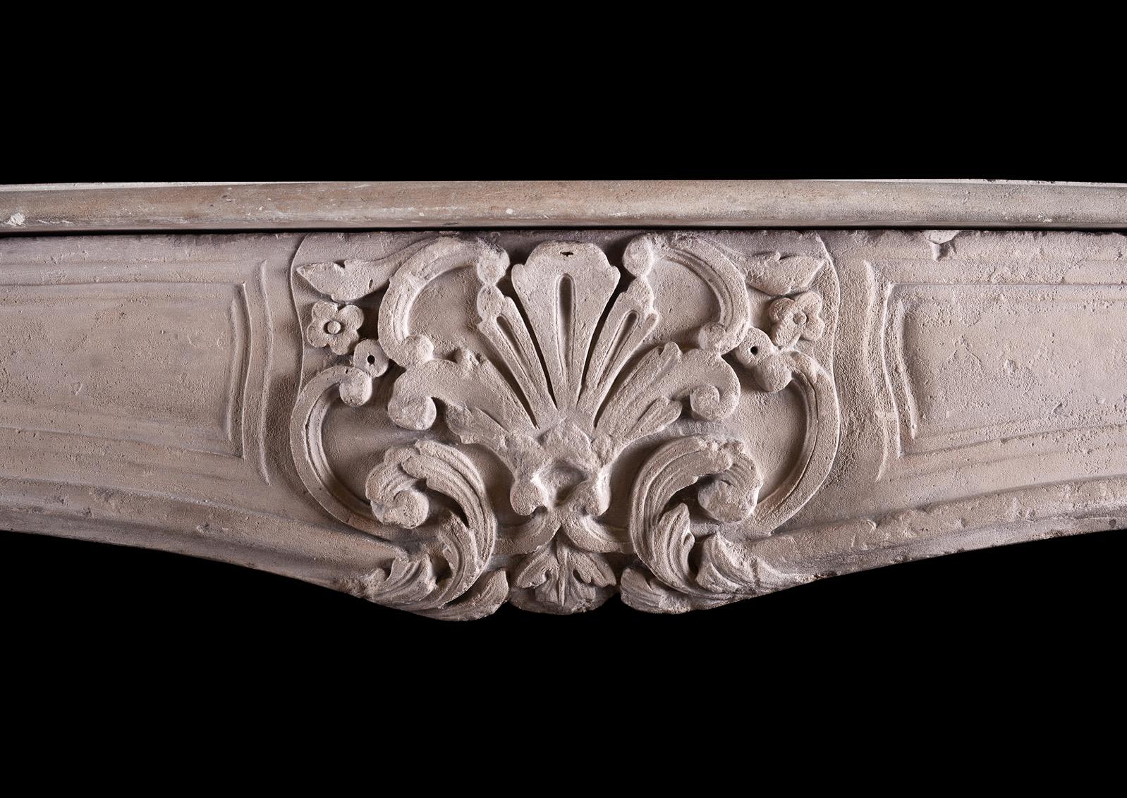 French Imposing Period Louis XV Carved Limestone Fireplace For Sale