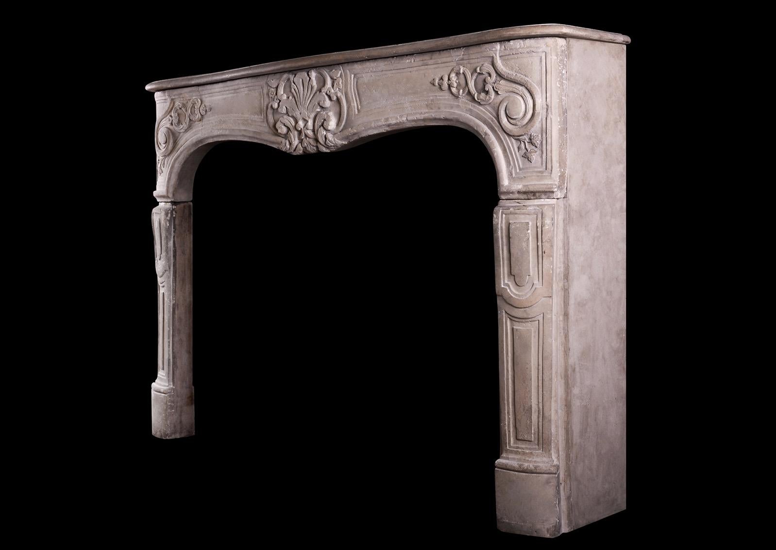 18th Century and Earlier Imposing Period Louis XV Carved Limestone Fireplace For Sale