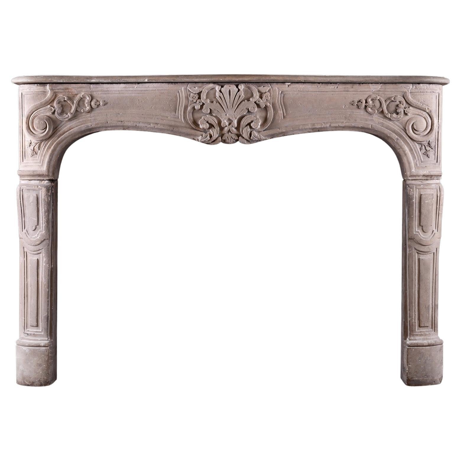 Imposing Period Louis XV Carved Limestone Fireplace For Sale