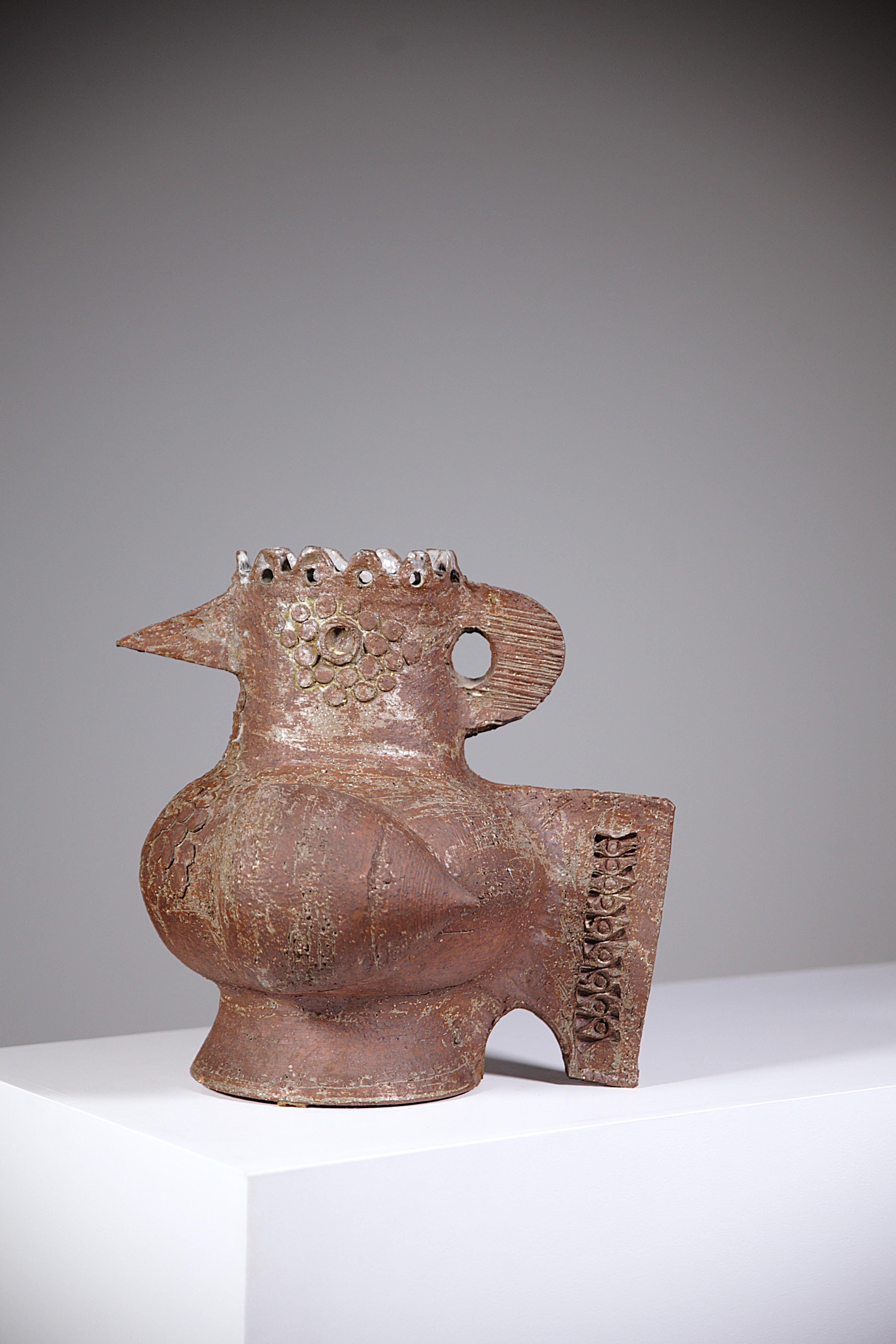 An impressive zoomorphic sculpture by Jacques Pouchain.

Stamp JP and Atelier Dieulefit.

France 1960s

In original good condition.

Report : A restoration by a professional on a wing ( please refer to the last photo ).