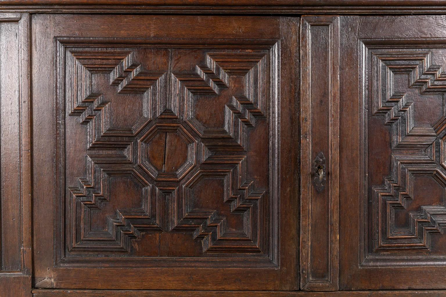 An impressive early 18th century Dutch oak geometric kussen cabinet with integra For Sale 2