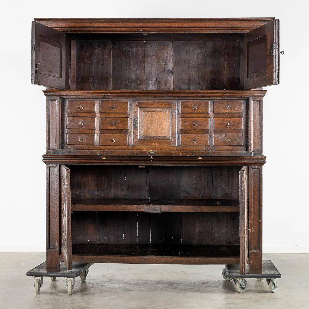 18th Century An impressive early 18th century Dutch oak geometric kussen cabinet with integra For Sale