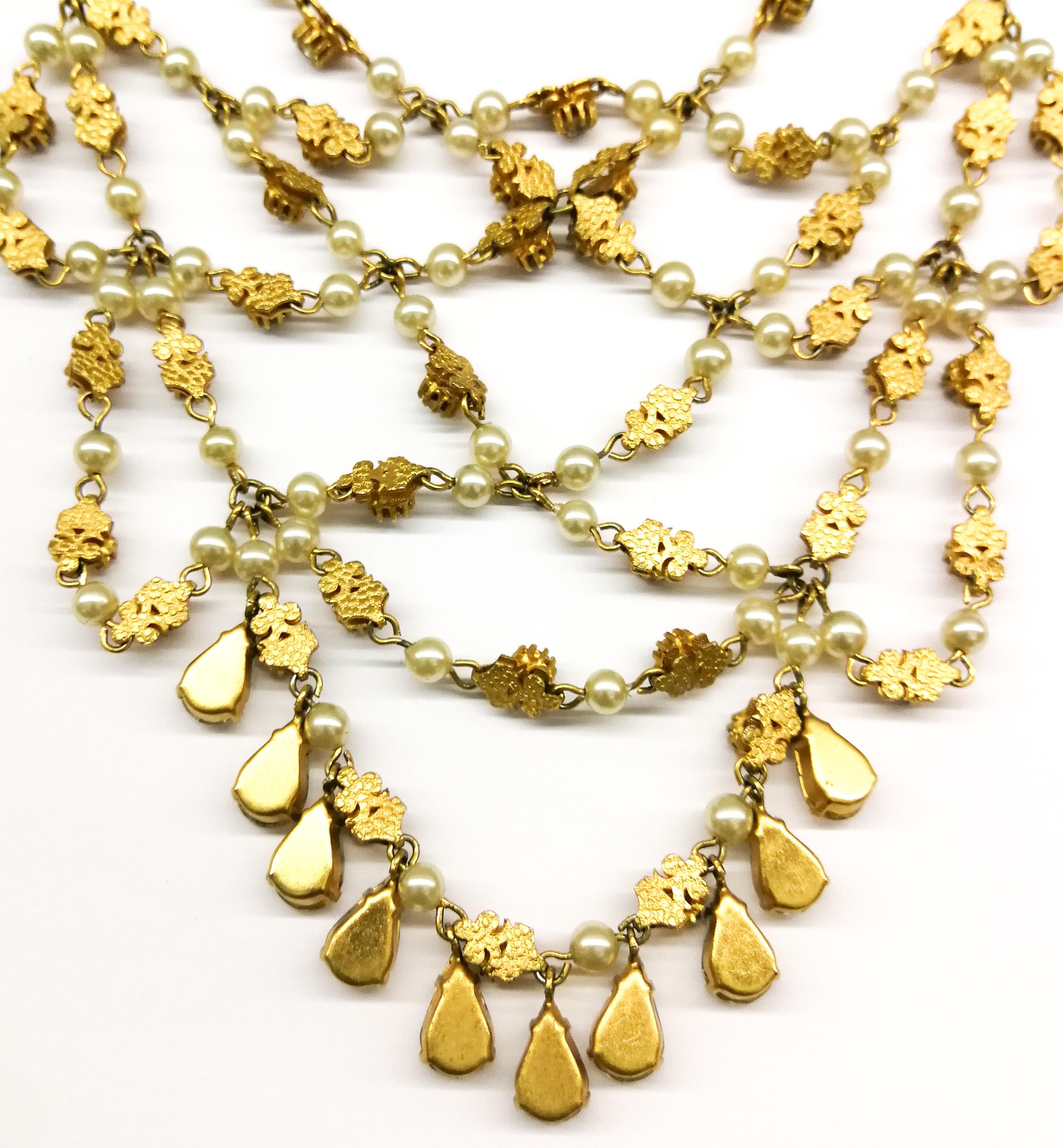An impressive 'festoon' necklace and matching earrings, Christian Dior, c. 1954. 6