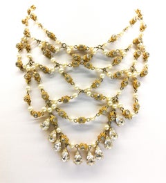 An impressive 'festoon' necklace and matching earrings, Christian Dior, c. 1954.