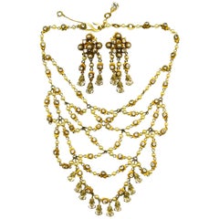 Vintage An impressive 'festoon' necklace and matching earrings, Christian Dior, c. 1954.