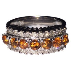 Impressionnante bague habillée en or blanc 18 carats, citrine dorée et diamants