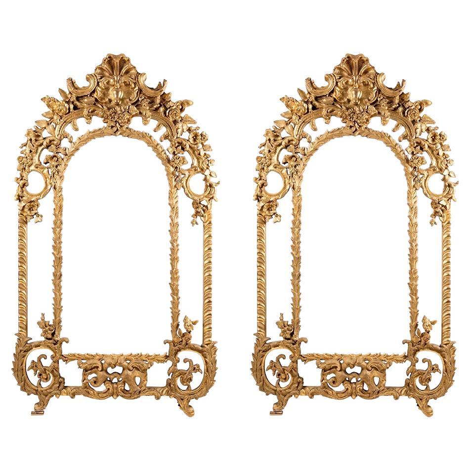 An impresive late 19 century match pair of Louis XIV style mirror in giltwood and gesso, the quality of the carving is top quality, the mirror have a little difference in the witdh
Measures: One mirror is 40.9 width
One mirror is 41.2 witdh 
When