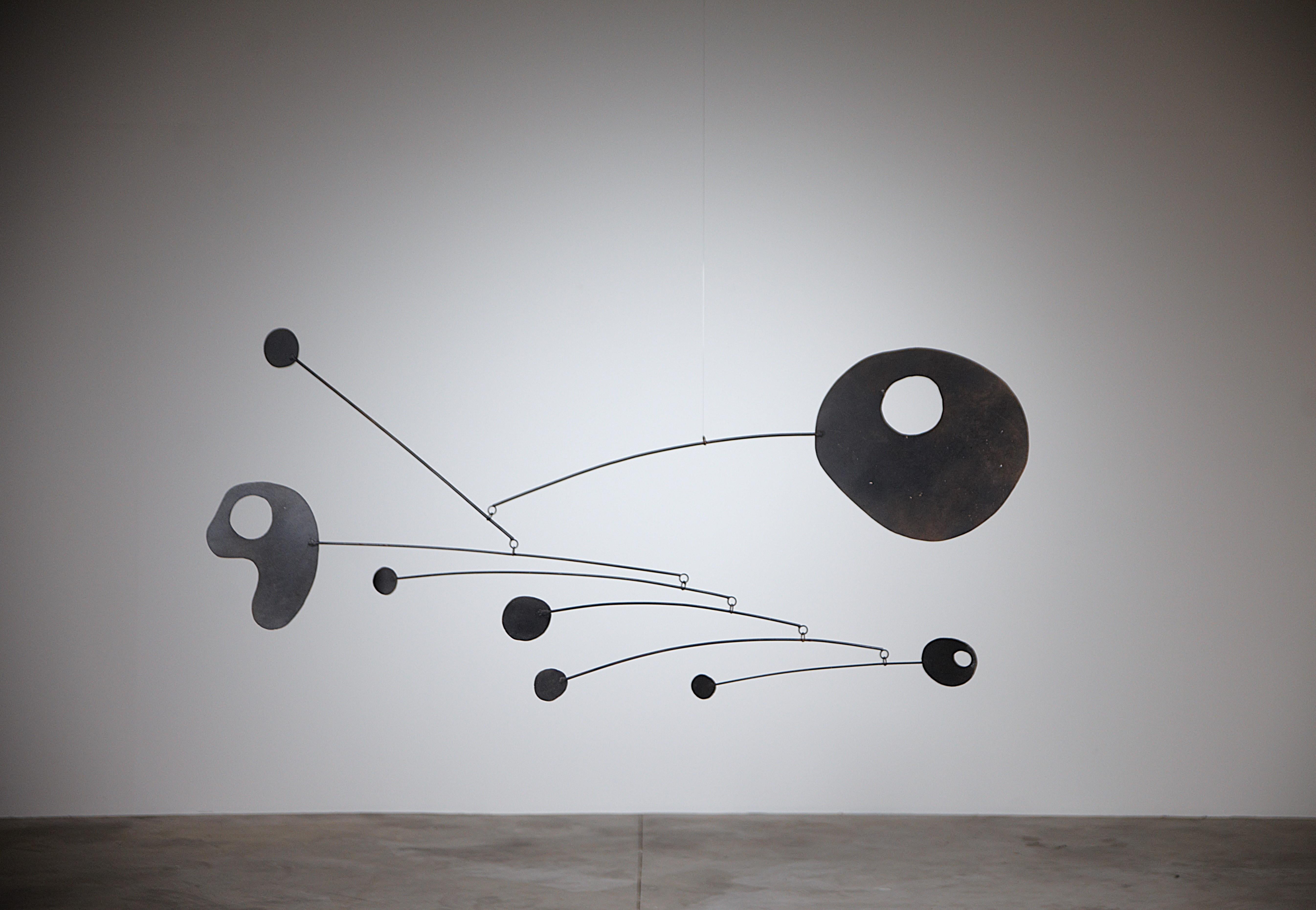An Impressive Mobile Sculpture by Guillaume Lanoux France 1980's

Big size.

In black painted

in original good condition

