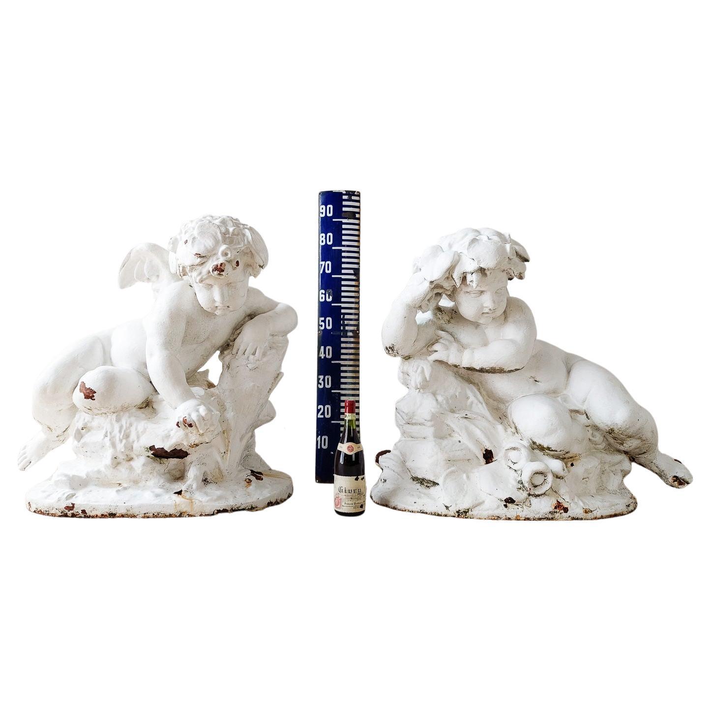 Impressive Pair of 19th Century Monumental Sized Cast Iron Putti For Sale